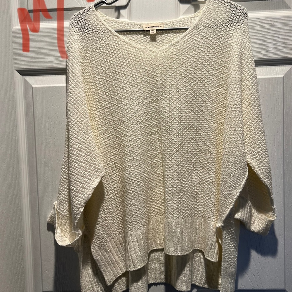 3/4 sleeve cream colored sweater. Size M/L